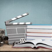 Set old books and Movies slate on the desk