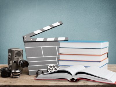 Set old books and Movies slate on the desk