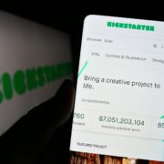 Stuttgart, Germany - 01-13-2023: Person holding cellphone with webpage of US crowdfunding platform Kickstarter PBC on screen in front of logo. Focus on center of phone display. Unmodified photo.