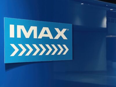 NEW YORK, USA - November 10, 2024: Sign with logo pointing to IMAX hall in modern cinema
