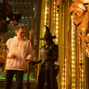 L to R: Director Jon M. Chu and Cynthia Erivo (as Elphaba) on the set of WICKED FOR GOOD, directed by Jon M. Chu.