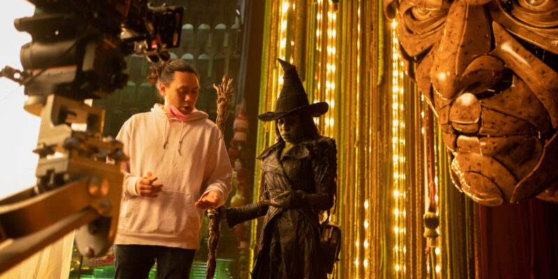 L to R: Director Jon M. Chu and Cynthia Erivo (as Elphaba) on the set of WICKED FOR GOOD, directed by Jon M. Chu.