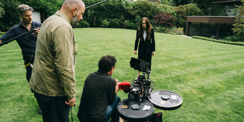 (L to R) Director Yorgos Lanthimos, director of photography Robbie Ryan and actor Emma Stone on the set of BUGONIA, a Focus Features release. Credit: Atsushi Nishijima/Focus Features © 2025 All Rights Reserved.